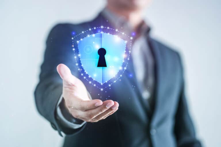 Businessman in formal suit presents commercial security solutions in NYC